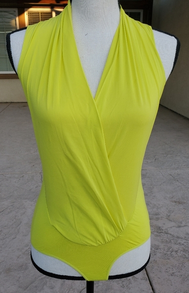 bebe Tops - Bebe sleeveless wrap bodysuit NWT